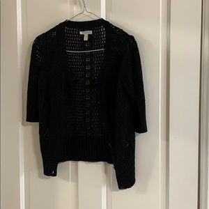 black knitted child’s sweater